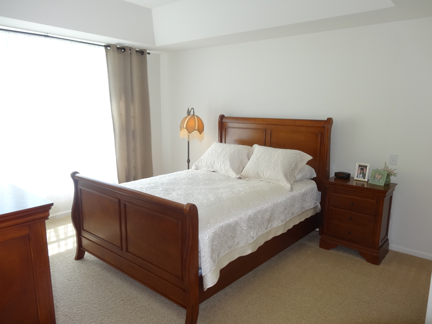 13528 Nealy Road Huntley, IL 60142 - Photo 20 of 39 a bedroom with a bed and a window