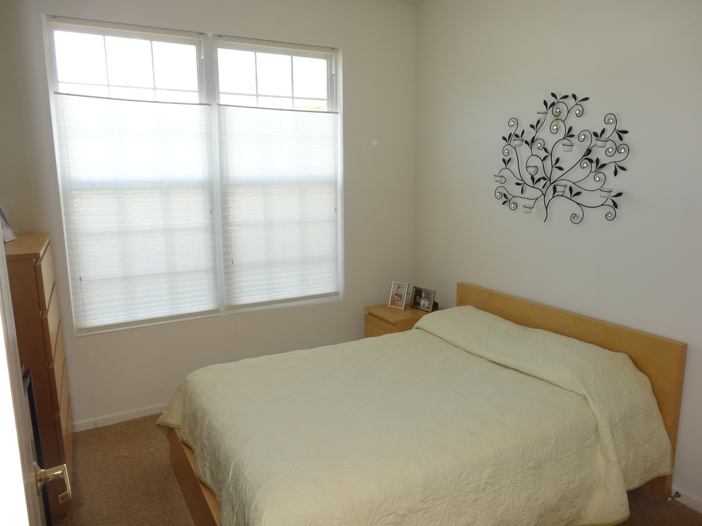 13528 Nealy Road Huntley, IL 60142 - Photo 29 of 39 a bedroom with a bed and a window