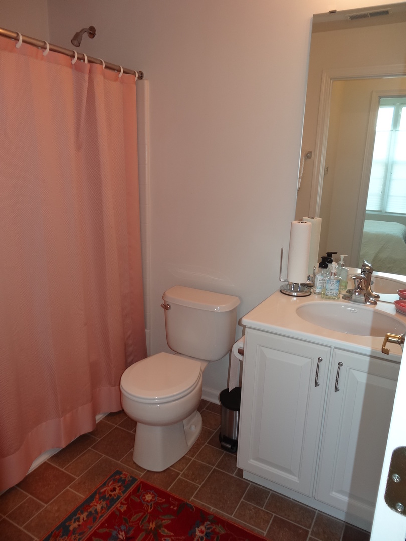13528 Nealy Road Huntley, IL 60142 - Photo 32 of 39 a bathroom with a sink toilet and shower