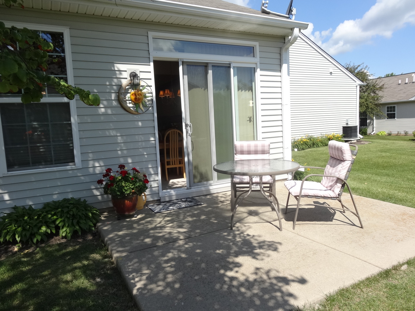 13528 Nealy Road Huntley, IL 60142 - Photo 33 of 39 a view of a house with backyard and sitting area