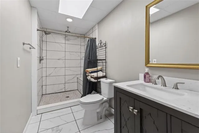 a kitchen with stainless steel appliances granite countertop a refrigerator sink and cabinets