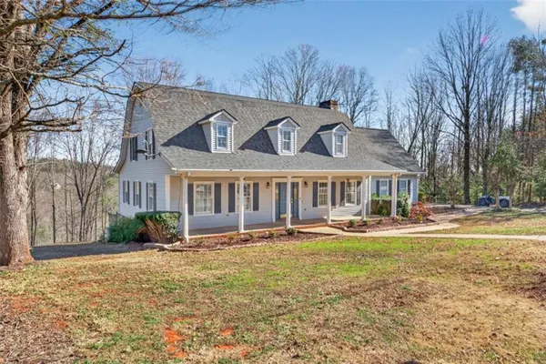 a front view of a house with patio