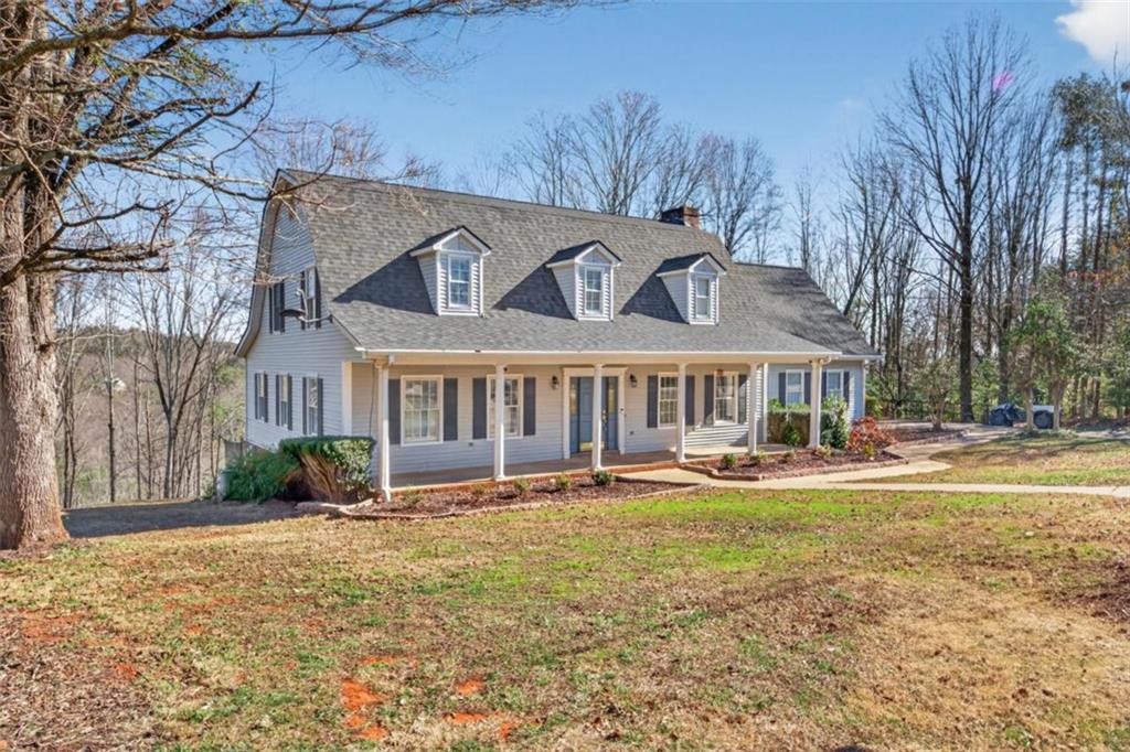 294 Hillcrest Heights Cornelia, GA 30531 - Photo 2 of 66 a front view of a house with patio