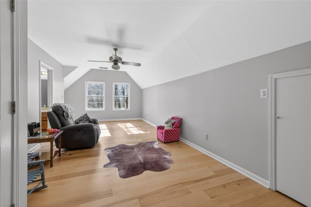 294 Hillcrest Heights Cornelia, GA 30531 - Photo 27 of 66 a living room with furniture and a large window