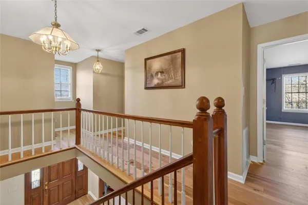 a kitchen with stainless steel appliances granite countertop a stove and a refrigerator