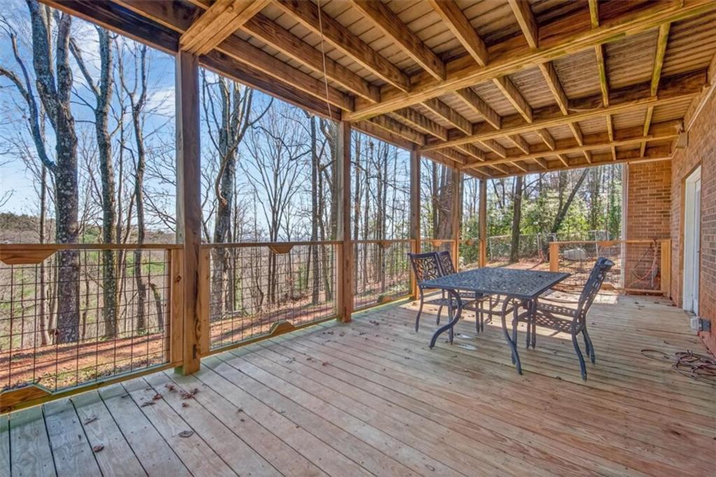 294 Hillcrest Heights Cornelia, GA 30531 - Photo 62 of 66 a view of a backyard with a patio