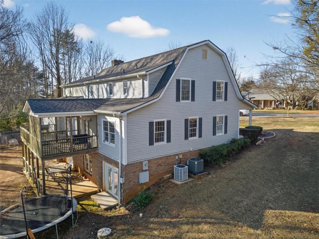 294 Hillcrest Heights Cornelia, GA 30531 - Photo 64 of 66 a front view of a house with garden