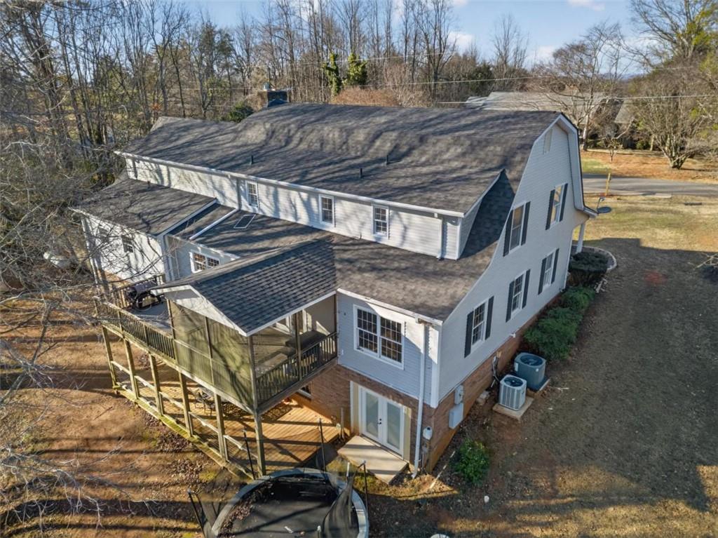 294 Hillcrest Heights Cornelia, GA 30531 - Photo 65 of 66 a aerial view of a house with a yard