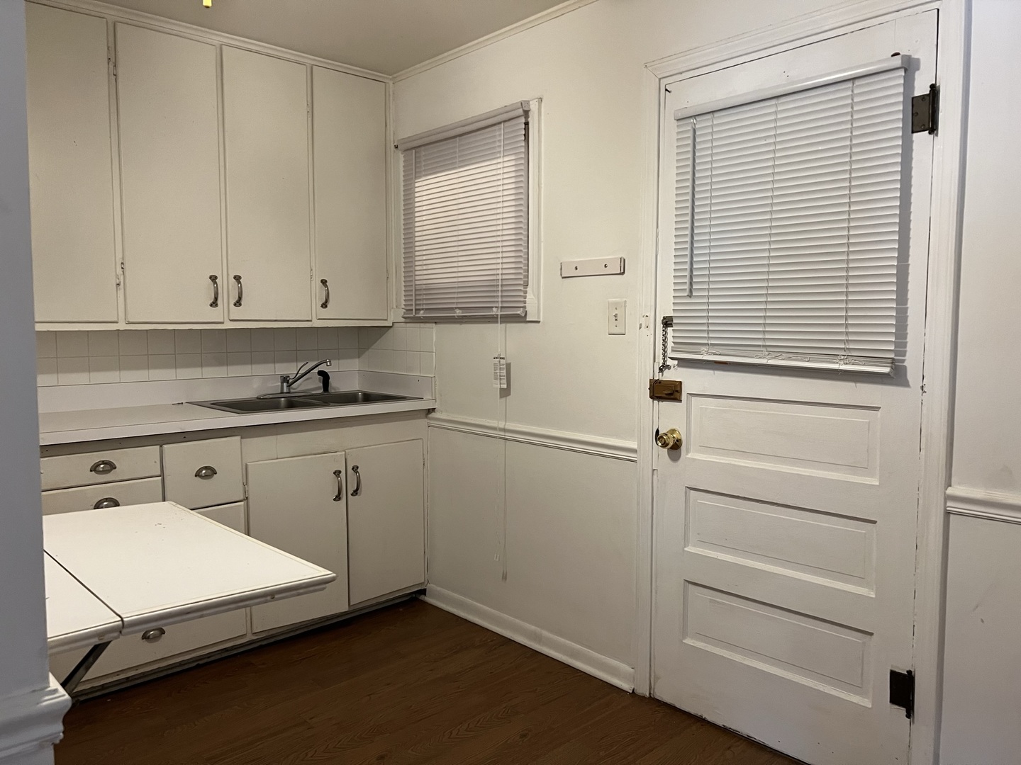 10 East Jefferson Avenue, Unit 2 Naperville, IL 60540 - Photo 8 of 13 a view of a kitchen with cabinets