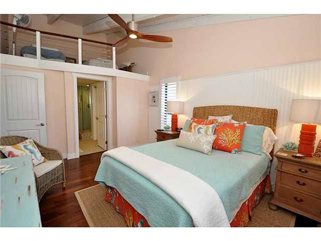 2355 Northeast Ocean Boulevard, Unit 37B Stuart, FL 34996 - Photo 12 of 24 a bedroom with a bed and a tv