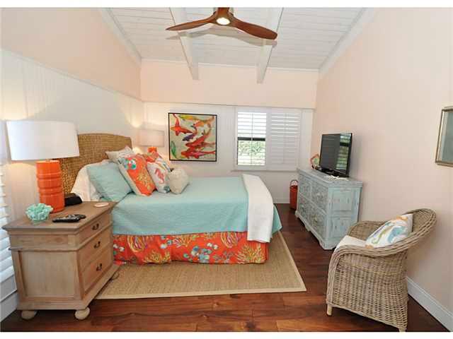 2355 Northeast Ocean Boulevard, Unit 37B Stuart, FL 34996 - Photo 13 of 24 a bedroom with furniture and a bed