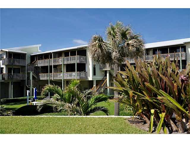 2355 Northeast Ocean Boulevard, Unit 37B Stuart, FL 34996 - Photo 22 of 24 a view of a house with a yard