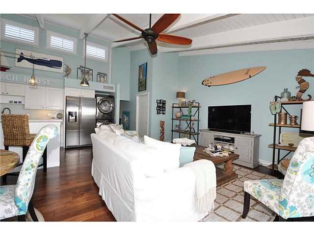 2355 Northeast Ocean Boulevard, Unit 37B Stuart, FL 34996 - Photo 3 of 24 a living room with furniture and a flat screen tv