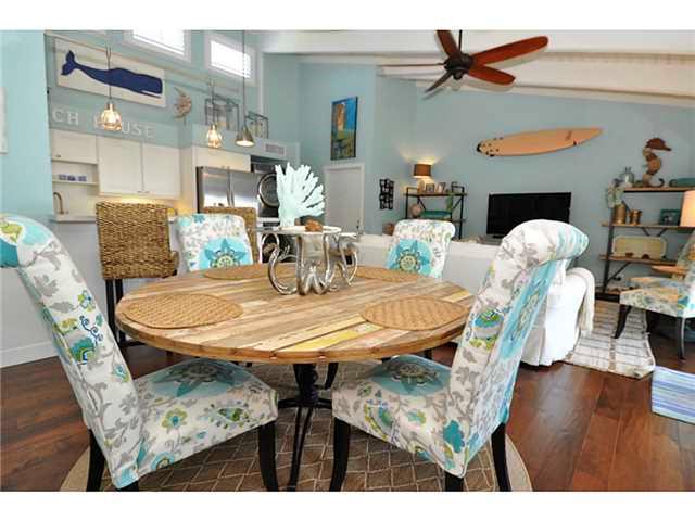 2355 Northeast Ocean Boulevard, Unit 37B Stuart, FL 34996 - Photo 4 of 24 a view of a dining room with furniture and wooden floor