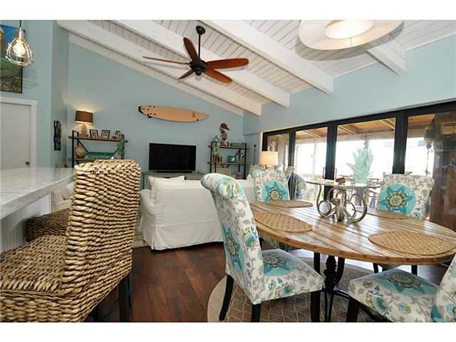 2355 Northeast Ocean Boulevard, Unit 37B Stuart, FL 34996 - Photo 10 of 24 a view of a dining room with furniture window and wooden floor