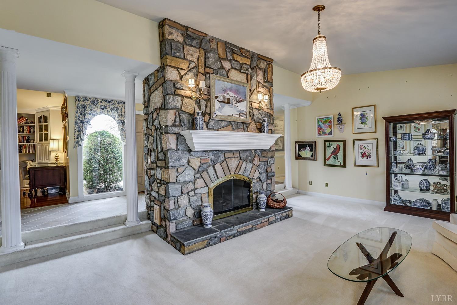 117 Sailview Drive Forest, VA 24551 - Photo 11 of 55 a living room with furniture and a fireplace