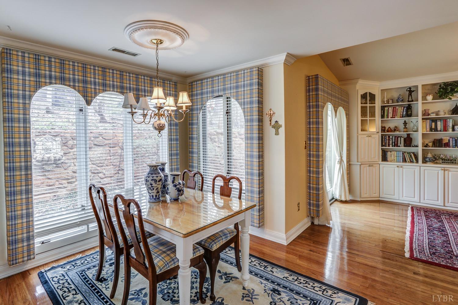 117 Sailview Drive Forest, VA 24551 - Photo 16 of 55 a dining room with furniture window and wooden floor