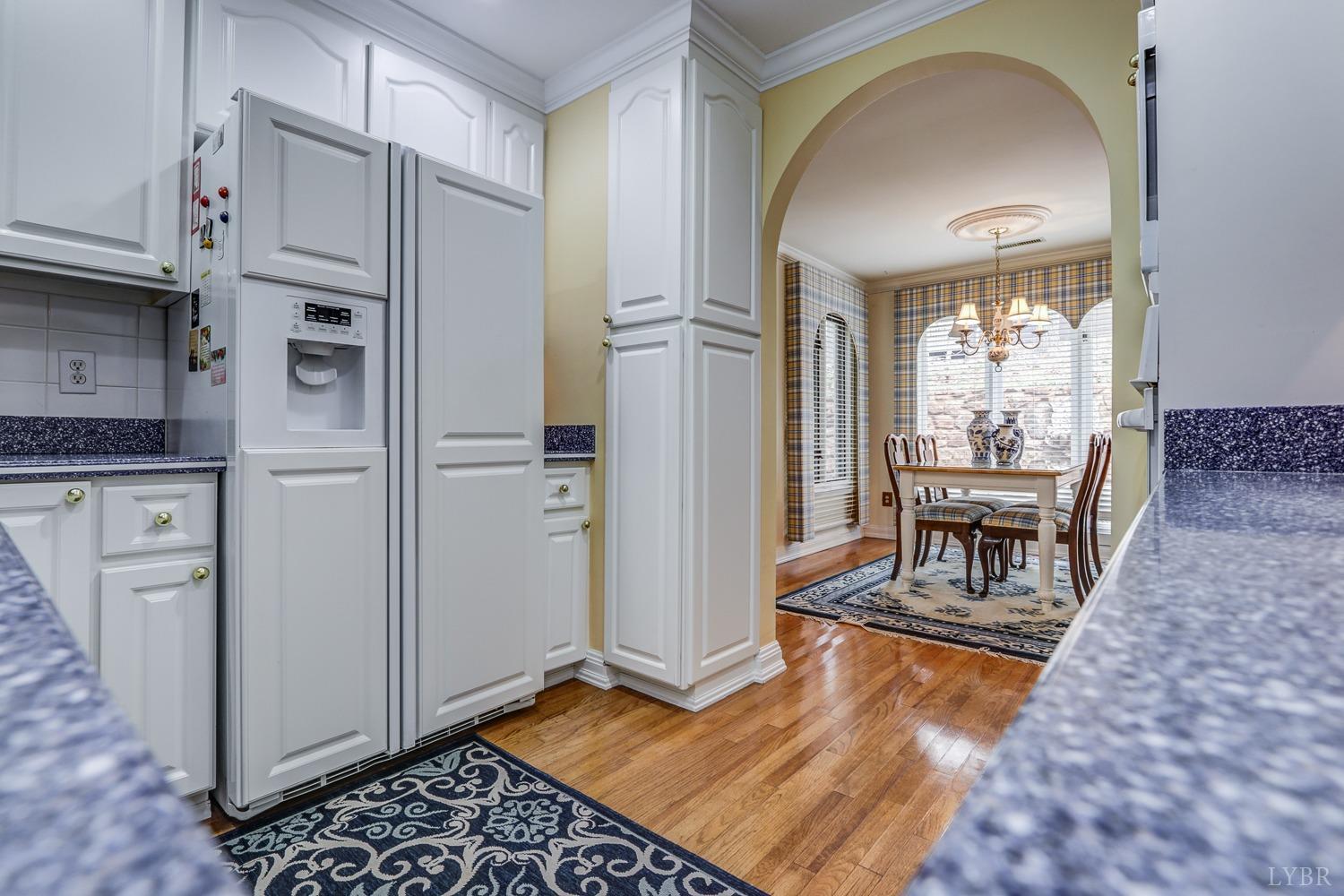 117 Sailview Drive Forest, VA 24551 - Photo 23 of 55 a living room with stainless steel appliances kitchen island granite countertop furniture and a fireplace