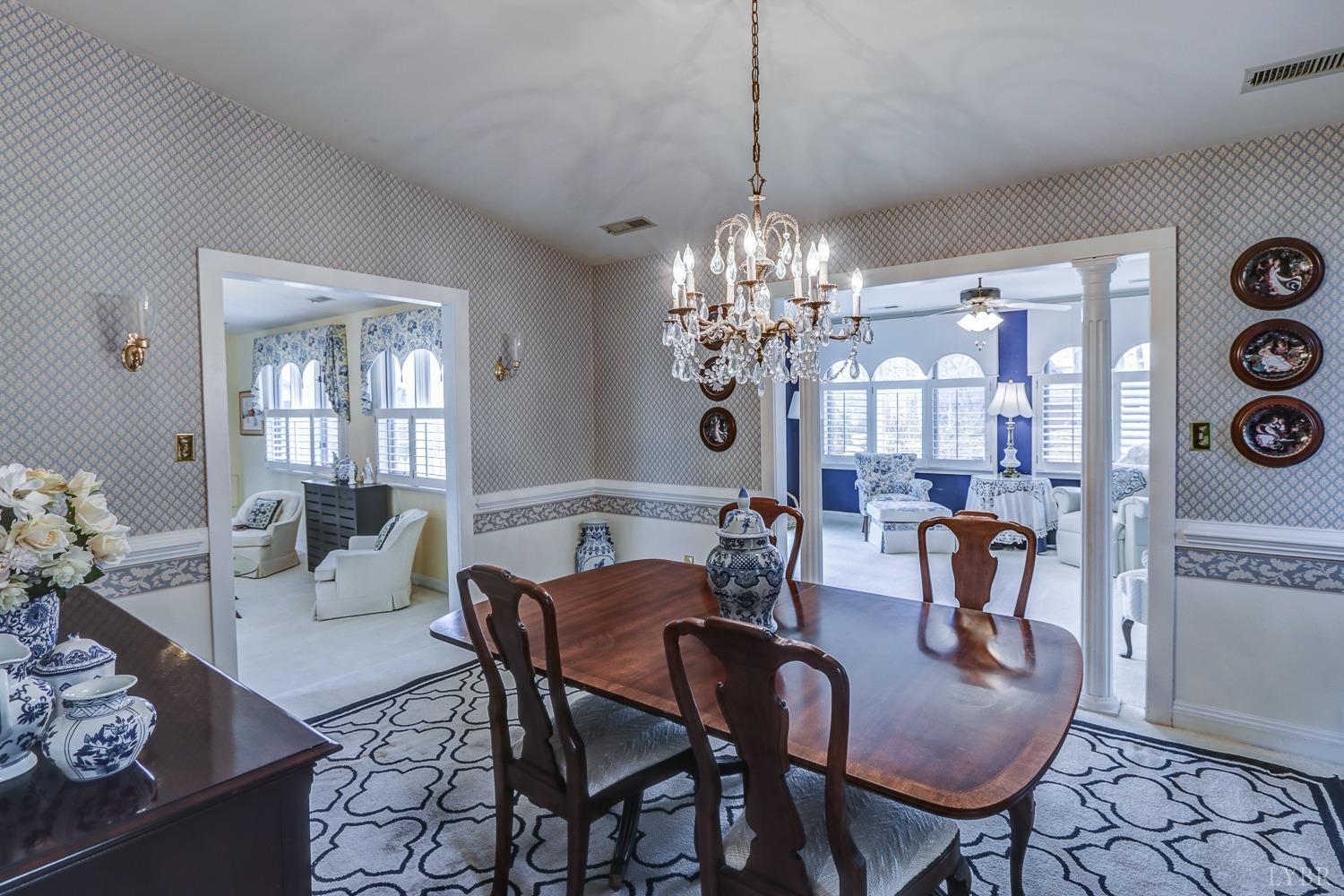 117 Sailview Drive Forest, VA 24551 - Photo 25 of 55 a view of a dining room with furniture window and chandelier