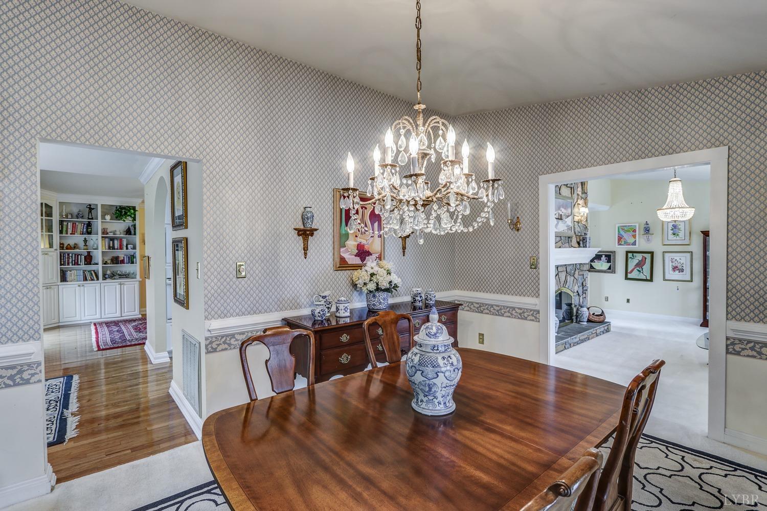 117 Sailview Drive Forest, VA 24551 - Photo 26 of 55 a view of a dining room with furniture and wooden floor