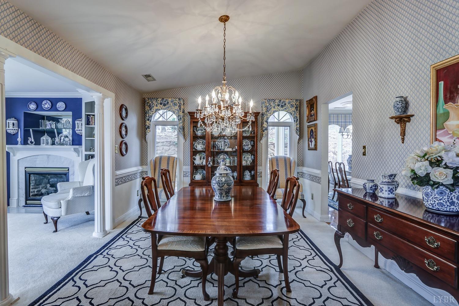 117 Sailview Drive Forest, VA 24551 - Photo 27 of 55 a view of a dining room with furniture and chandelier
