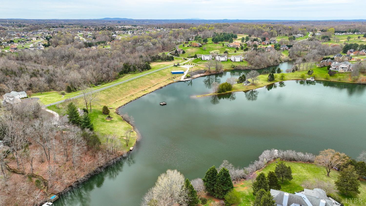 117 Sailview Drive Forest, VA 24551 - Photo 52 of 55 an aerial view of a house with a lake view