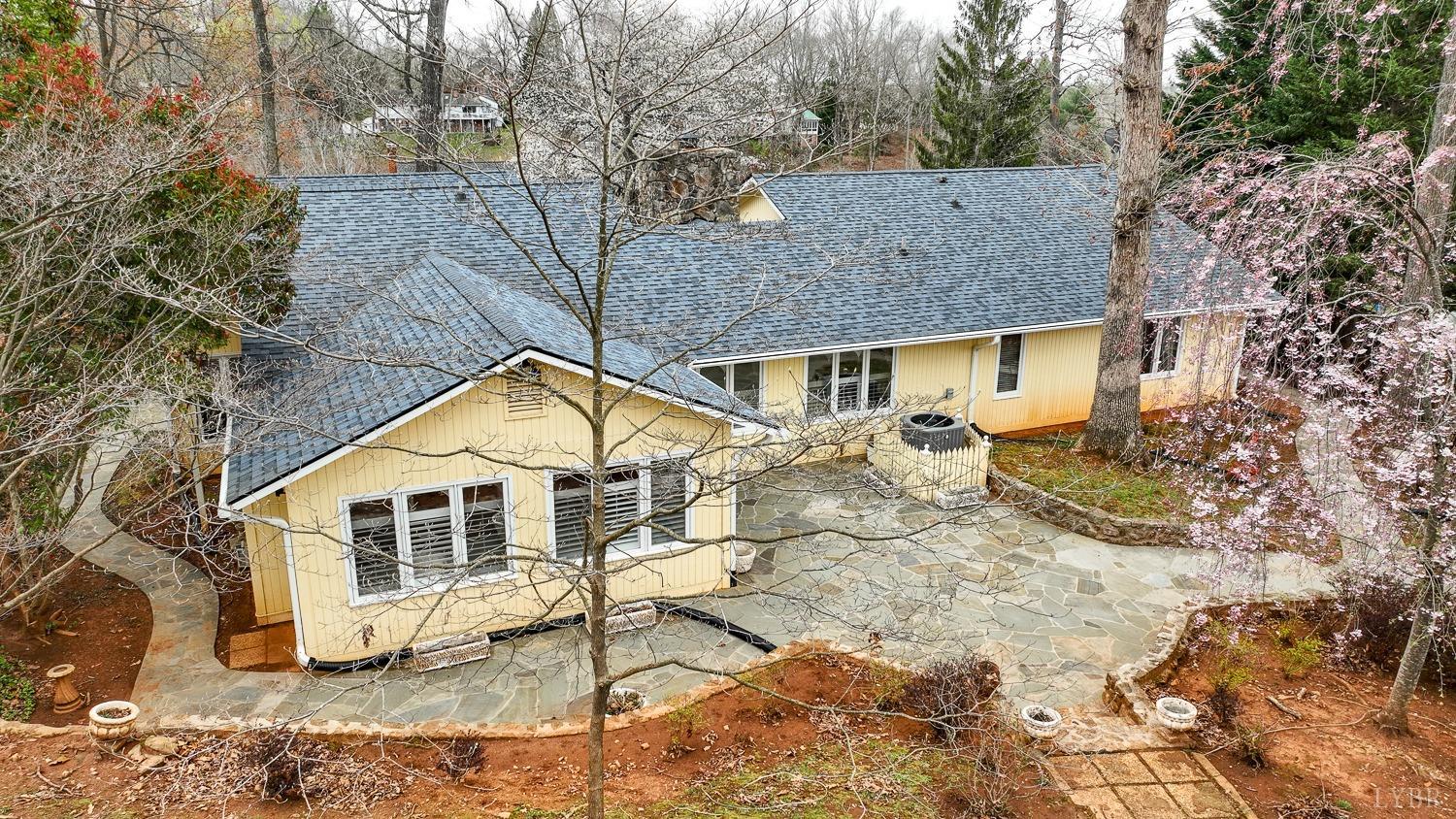 117 Sailview Drive Forest, VA 24551 - Photo 6 of 55 a view of a white house with a yard covered in snow