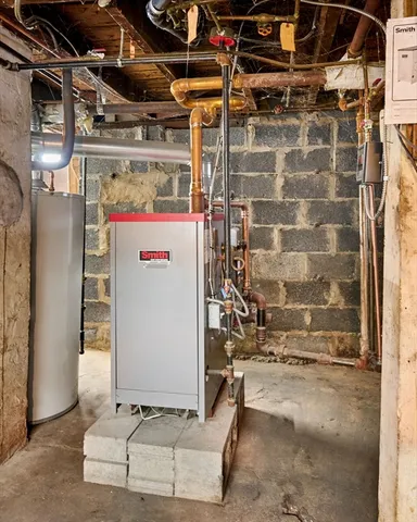 a utility room with stainless steel appliances