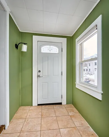 a view of a room that has a window in it