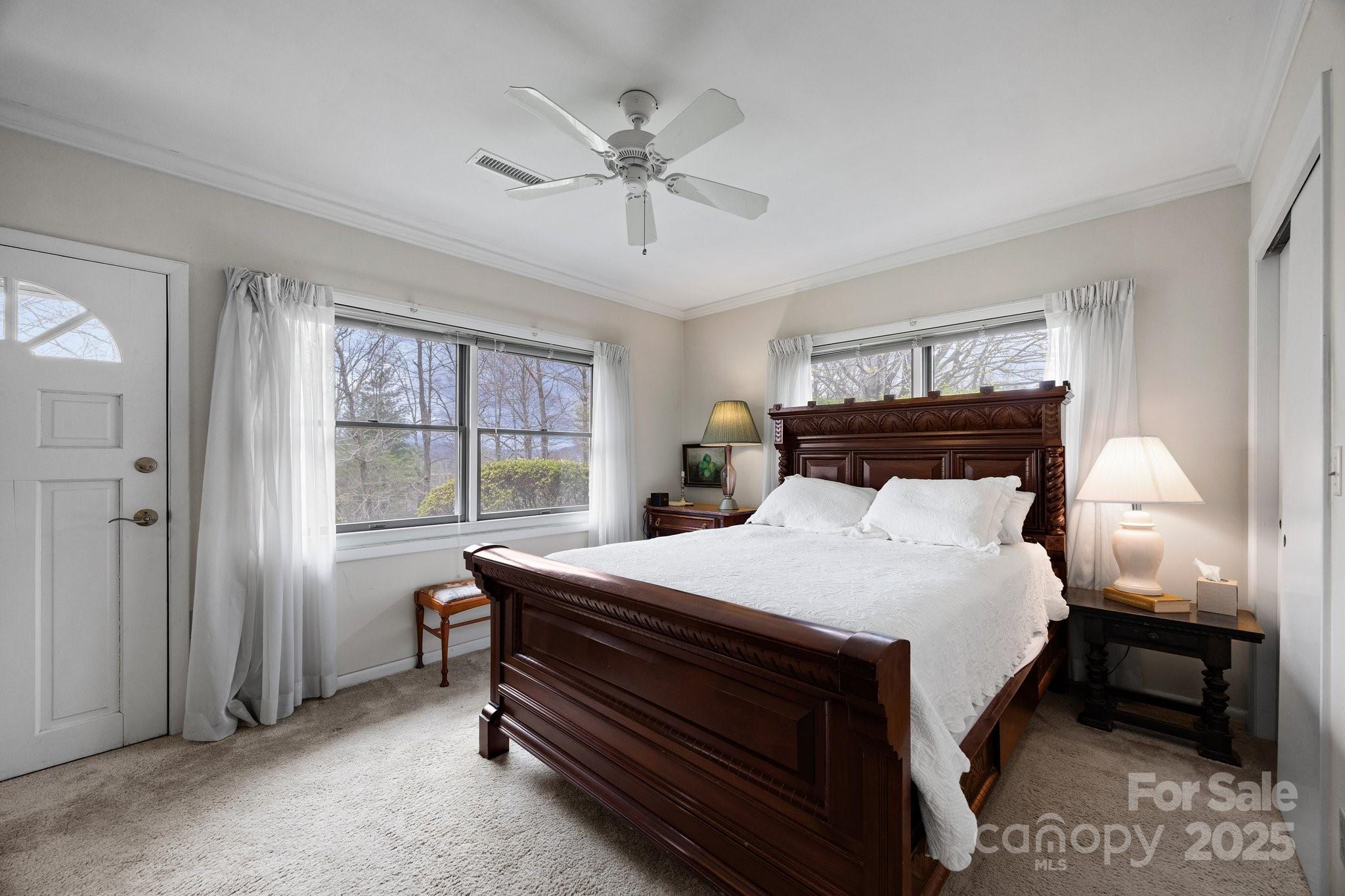 457 Overlook Drive Spruce Pine, NC 28777 - Photo 20 of 33 a bedroom with a bed and a window