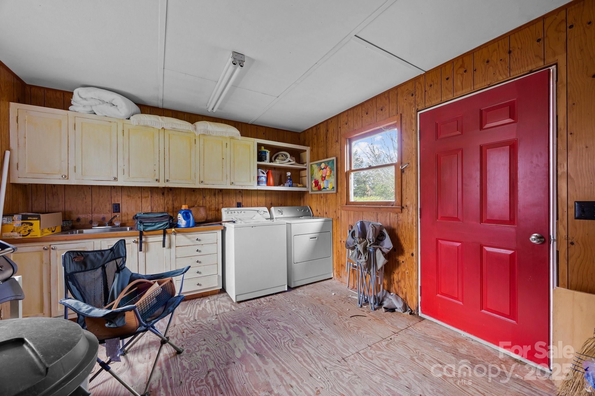 457 Overlook Drive Spruce Pine, NC 28777 - Photo 23 of 33 a view of a kitchen with fridge and workspace