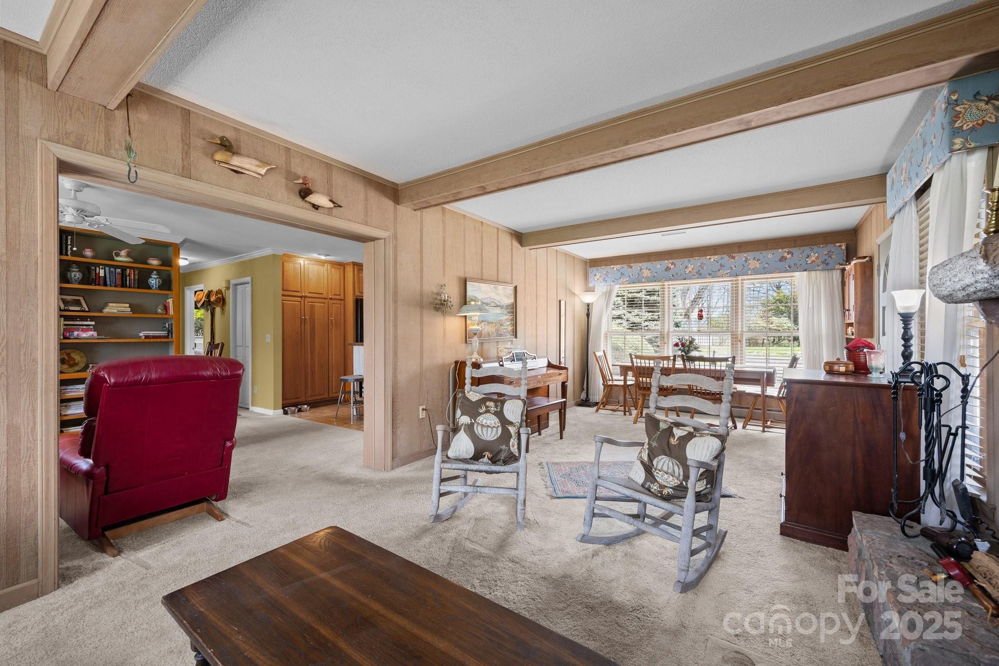 457 Overlook Drive Spruce Pine, NC 28777 - Photo 6 of 33 a living room with furniture a rug and white walls