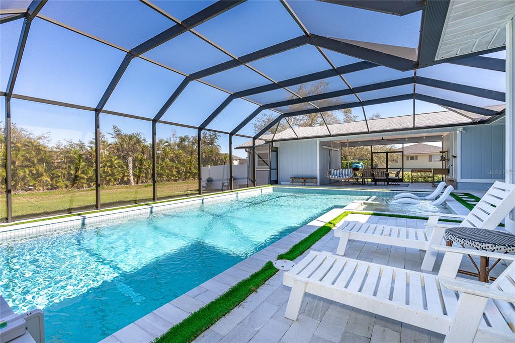 320 Anchor Row Placida, FL 33946 - Photo 20 of 41 a view of swimming pool with a patio