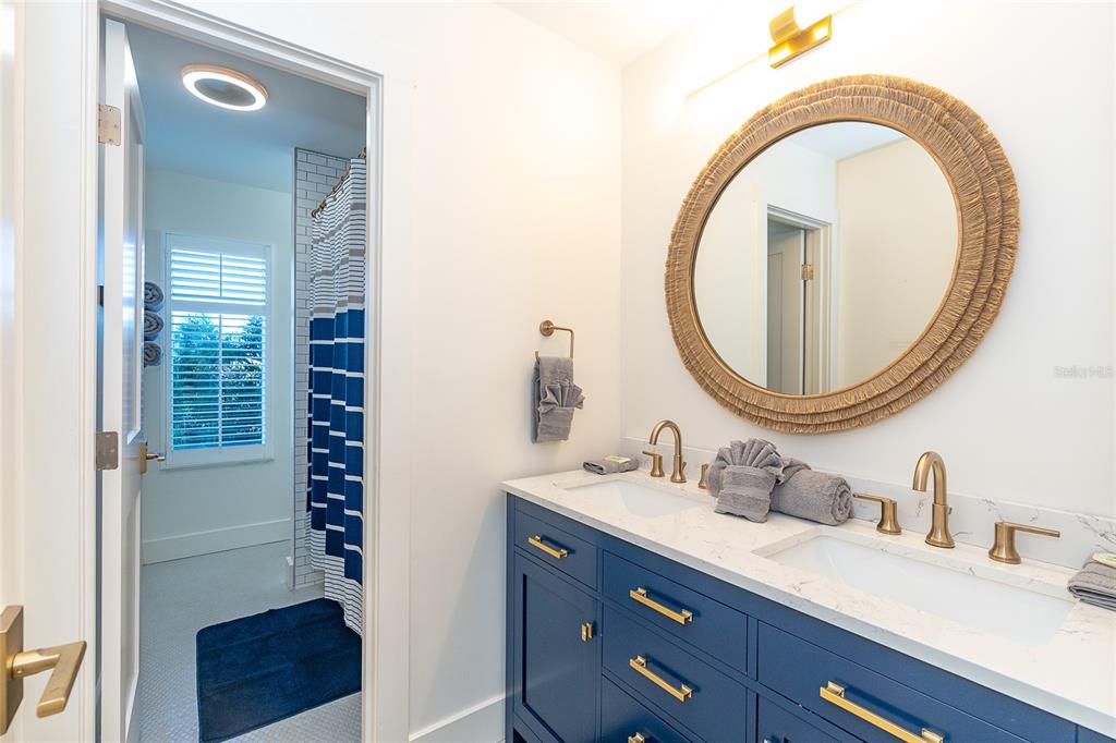 320 Anchor Row Placida, FL 33946 - Photo 29 of 41 a bathroom with a sink and a mirror