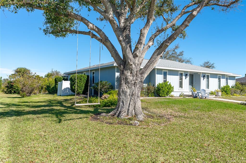 320 Anchor Row Placida, FL 33946 - Photo 36 of 41 a view of a house with a yard