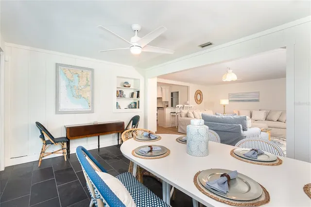 a dining room with furniture and a table