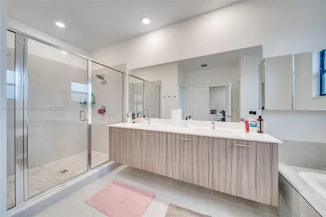a view of a hallway with closet and a couch