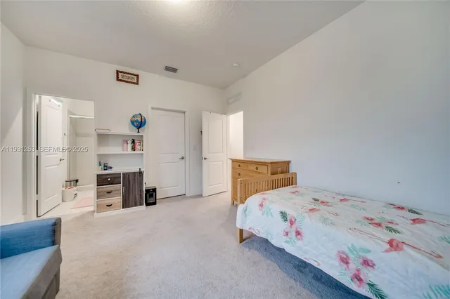 a view of a house with a yard porch and sitting area