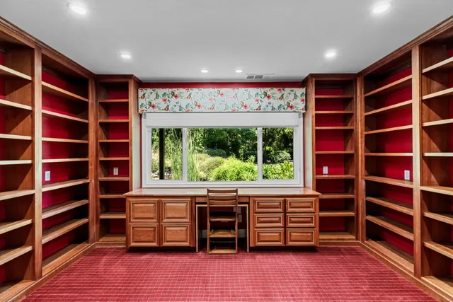 a view of a room with racks on the wall