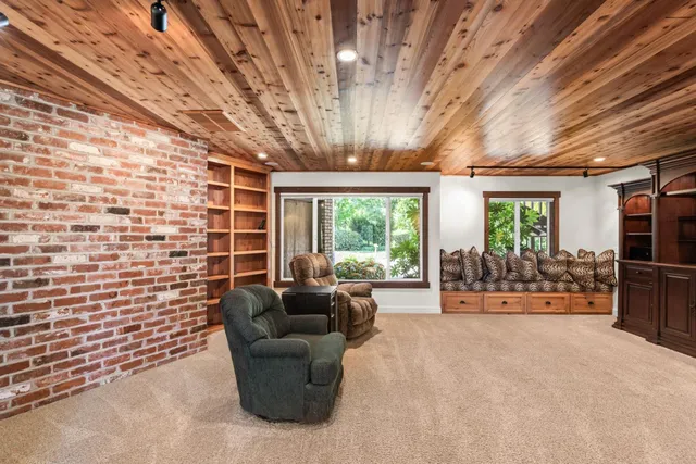 a view of fireplace and window