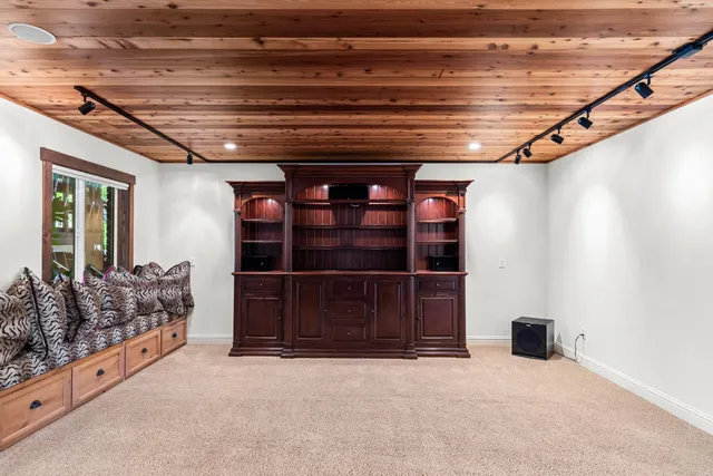 a view of a house and wooden floor