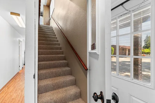 an aerial view of residential house with outdoor space and street view