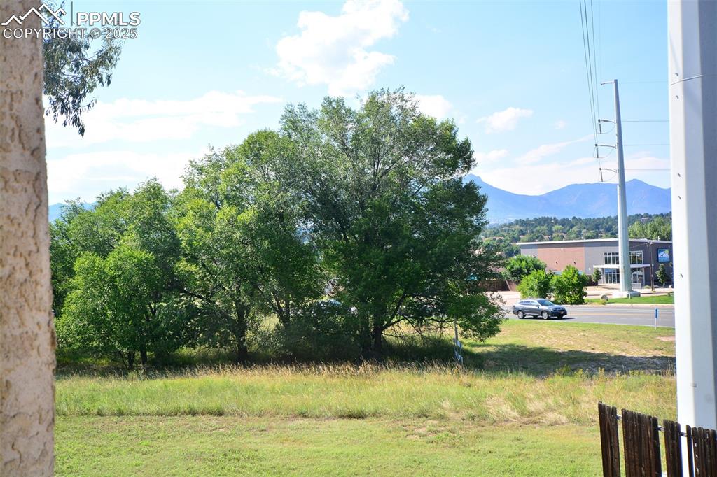 1021 Dublin Boulevard Colorado Springs, CO 80918 - Photo 18 of 20 a view of a lake with a mountain in the background