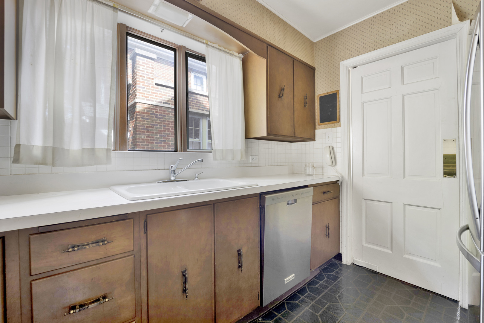 410 Audubon Road Riverside, IL 60546 - Photo 7 of 31 a bathroom with a sink and a mirror