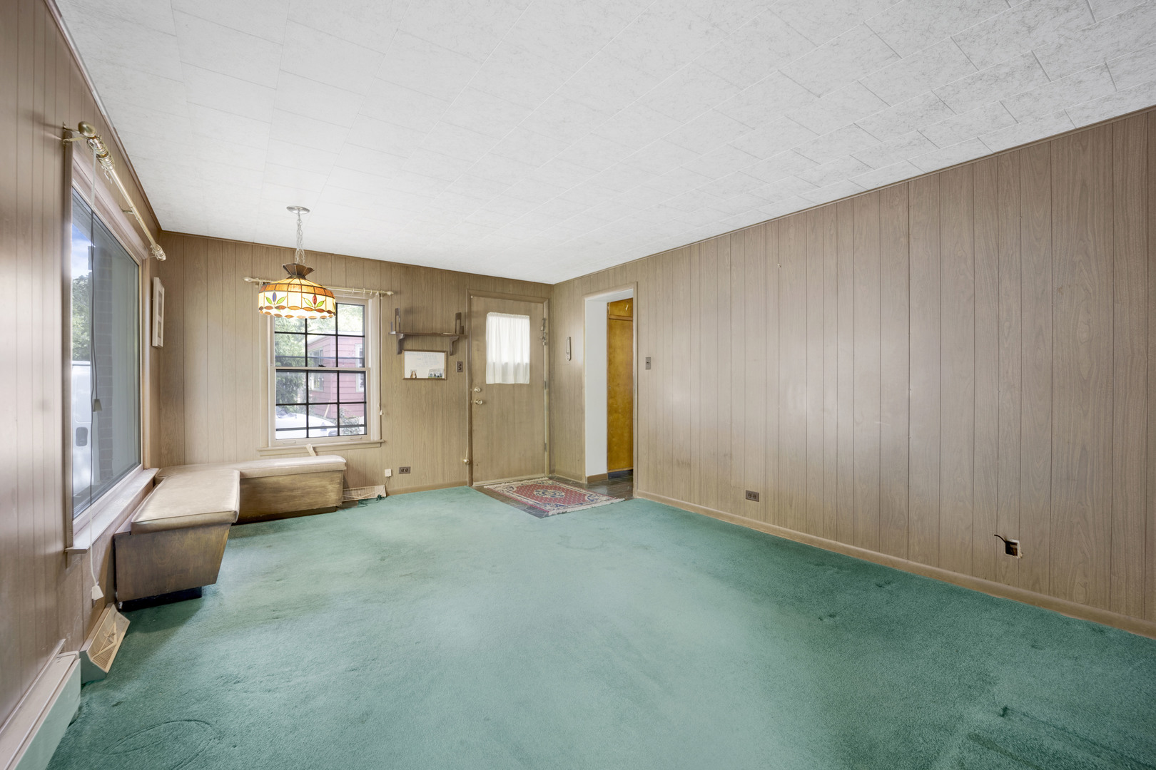 410 Audubon Road Riverside, IL 60546 - Photo 10 of 31 a view of an empty room with a window