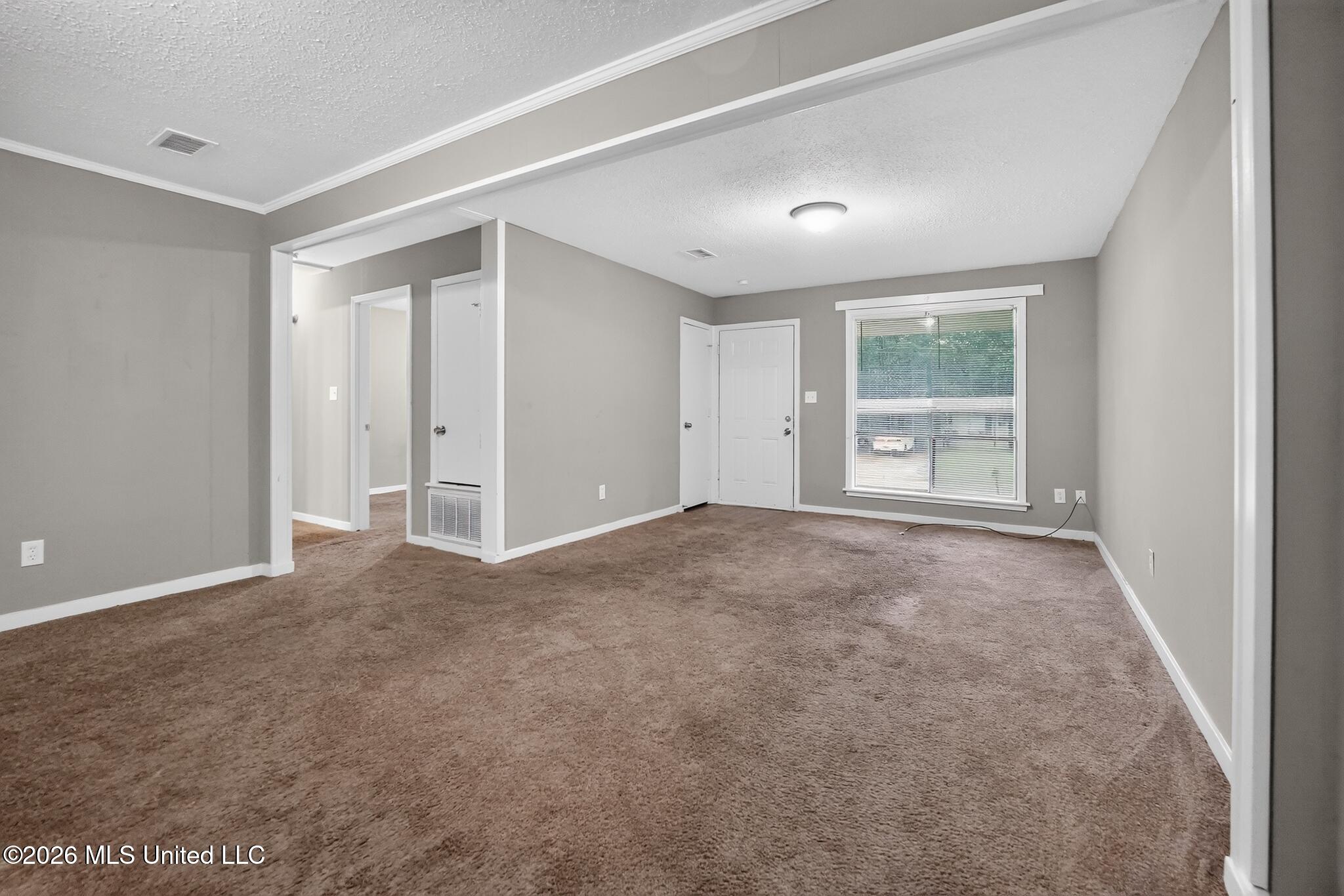 1089 Branch Street Jackson, MS 39212 - Photo 5 of 20 06_1089_Branch_St-Living_room-8451