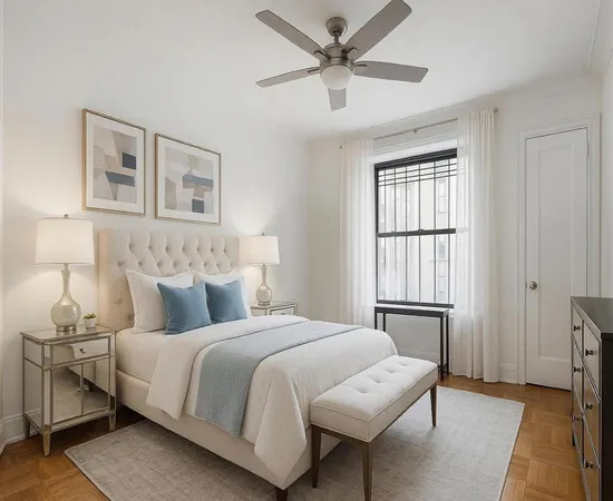 a bedroom with furniture and a window