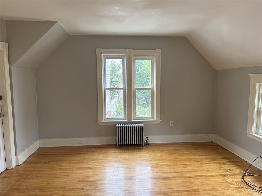 5 Arbor Vitae Street, Unit 2 Worcester, MA 01603 - Photo 7 of 12 a view of a room with window