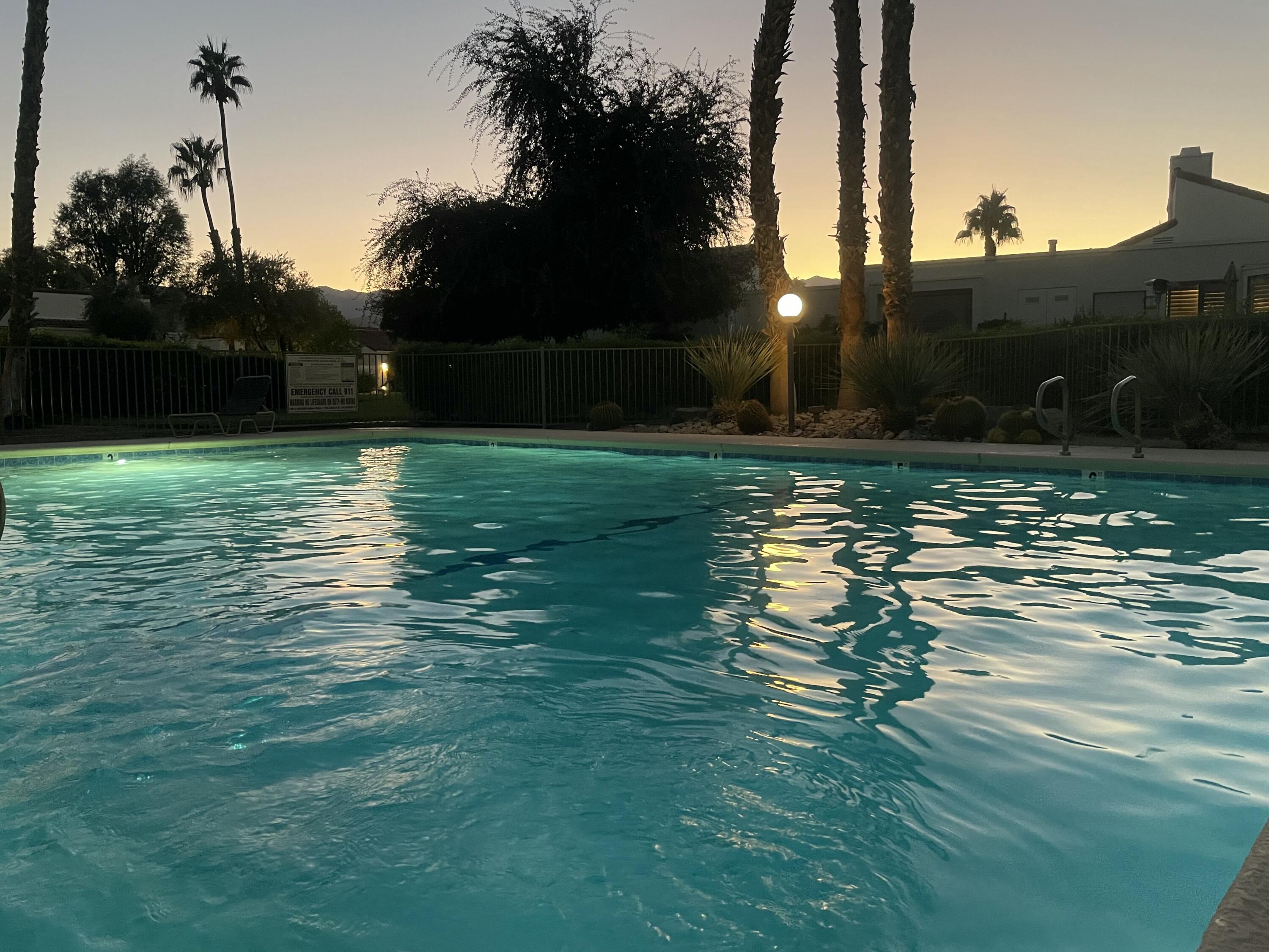 829 Inverness Drive Rancho Mirage, CA 92270 - Photo 3 of 27 a yard with lots of green space and trees