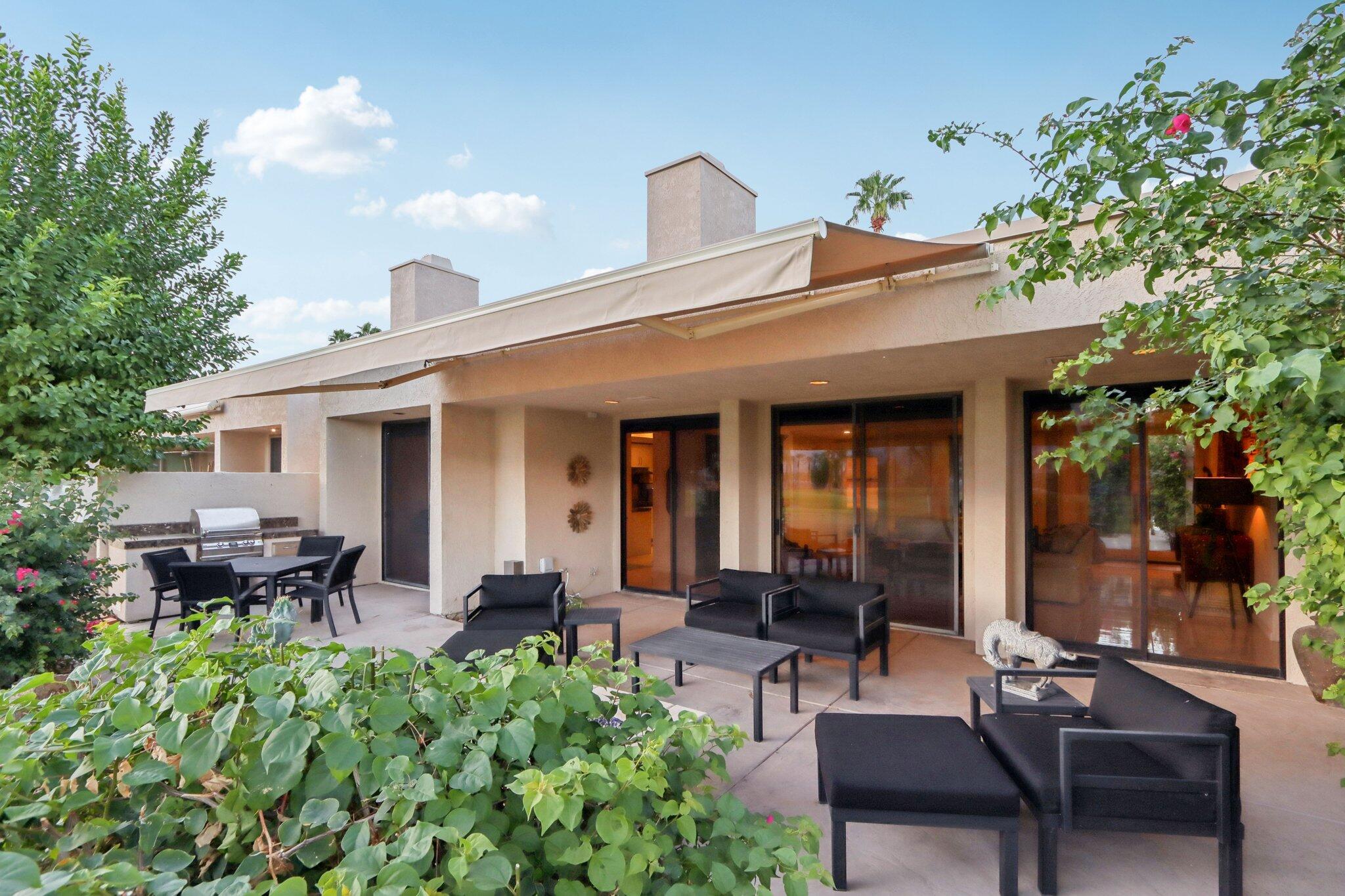 829 Inverness Drive Rancho Mirage, CA 92270 - Photo 6 of 27 a view of a house with sitting area and furniture